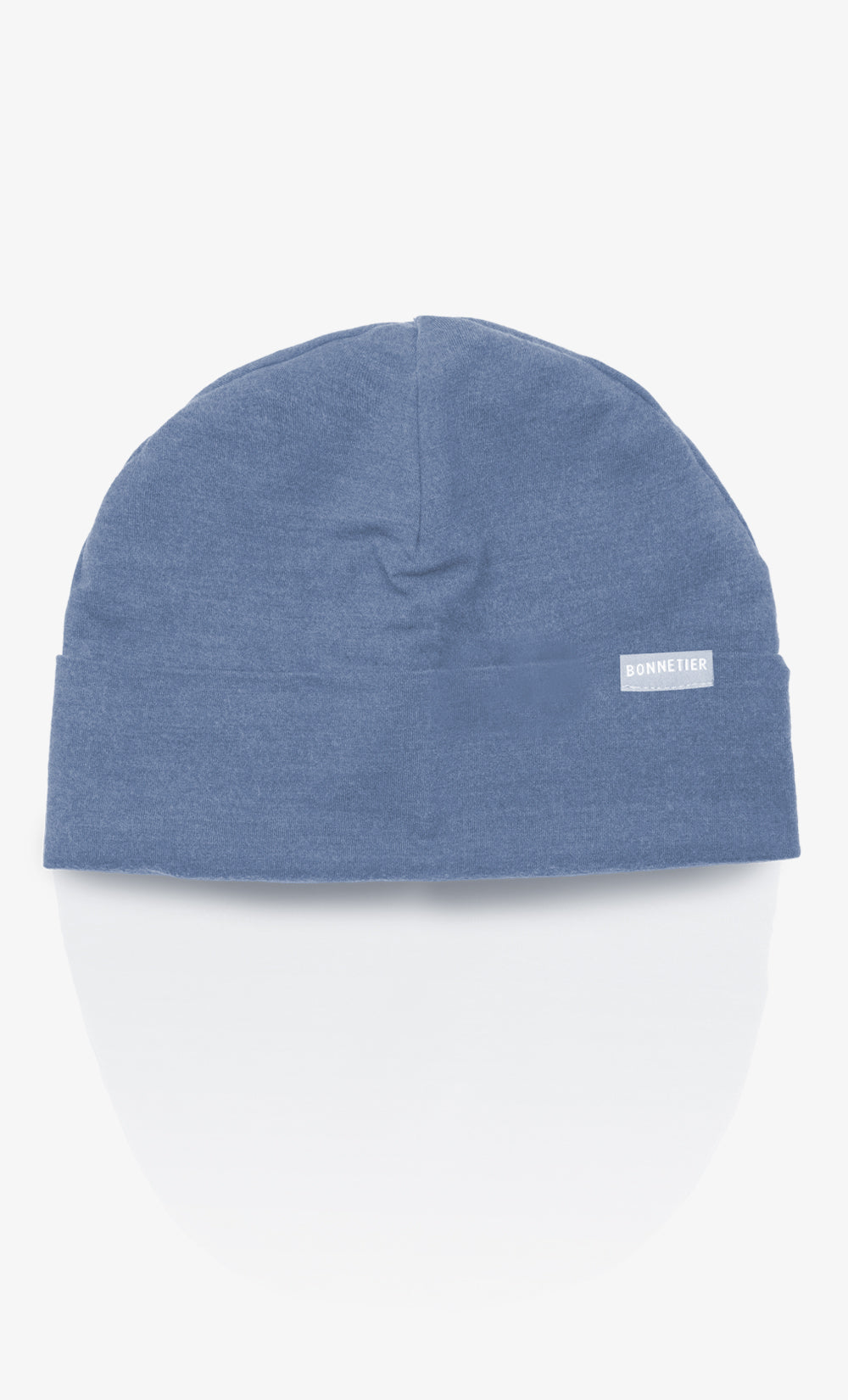 Tuque en laine mérinos bleu-gris chiné fabriquée au Canada.
